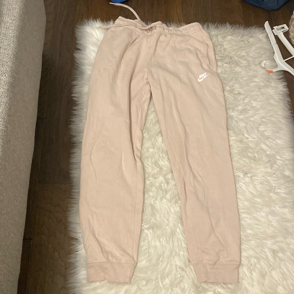 Cream colored Nike sweatpants